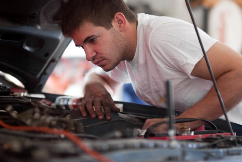 Man working on car